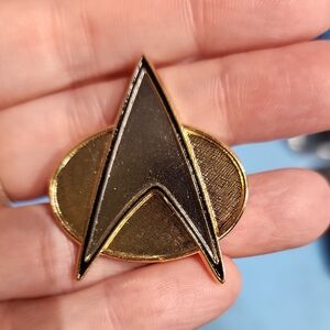 Gold and Black Star Trek Pin